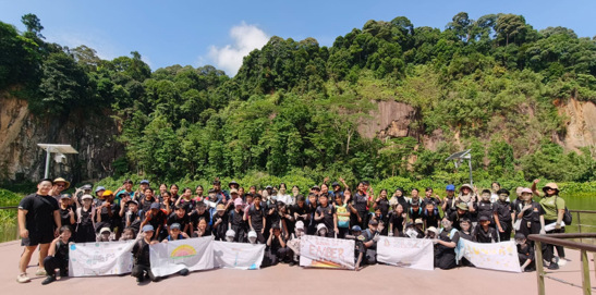 Students posing for a group photo during an outdoor learning programme.