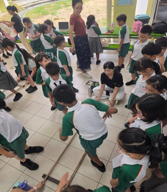 Students participating in a movement-based team challenge during CCE.