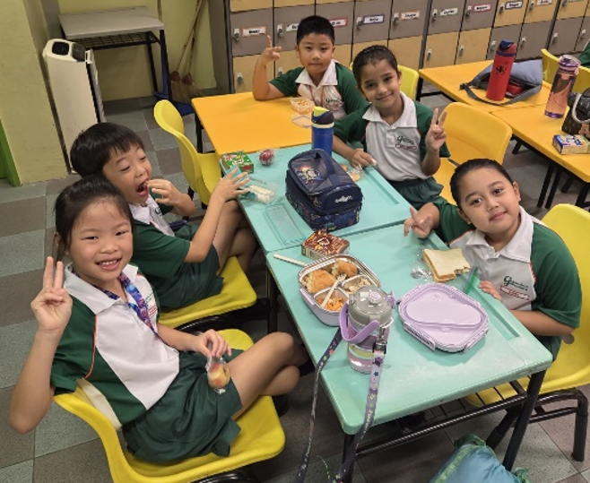 Students enjoying recess together in the school classroom.