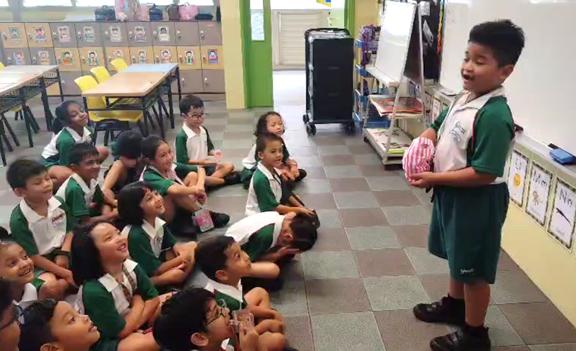A student confidently presenting during Pick-and-Tell