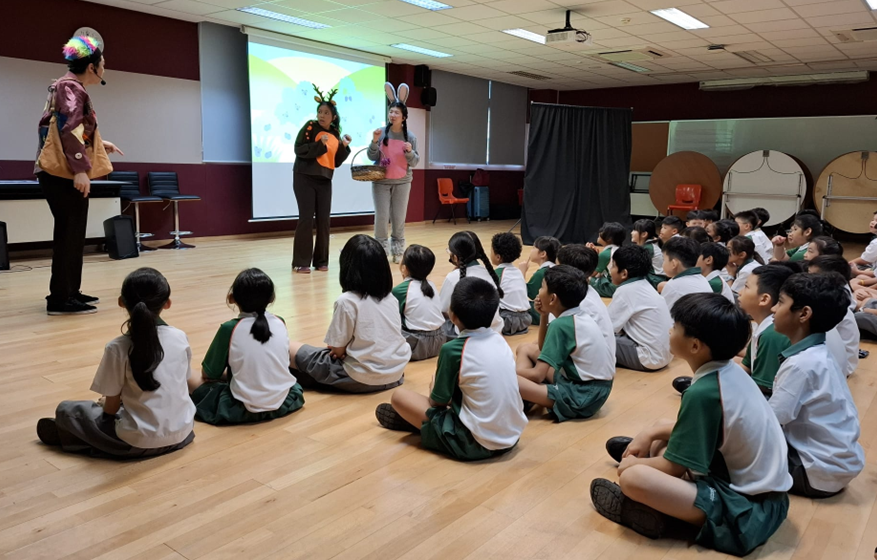 Students watching a live theatrical performance
