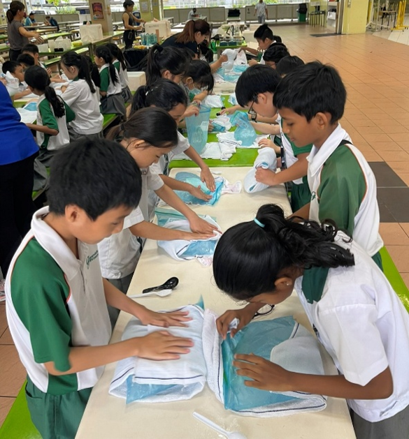 Students preparing their ice cream from scratch