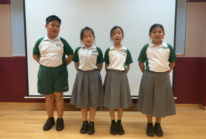 Students presenting persuasive speeches based on their ice-cream creations